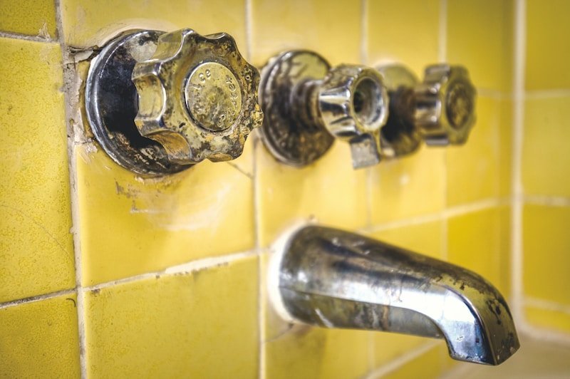 Your Dream Bath Awaits: Master Bathroom Remodel in Mt. Kisco, NY 2 old stainless steel faucet on white ceramic sink