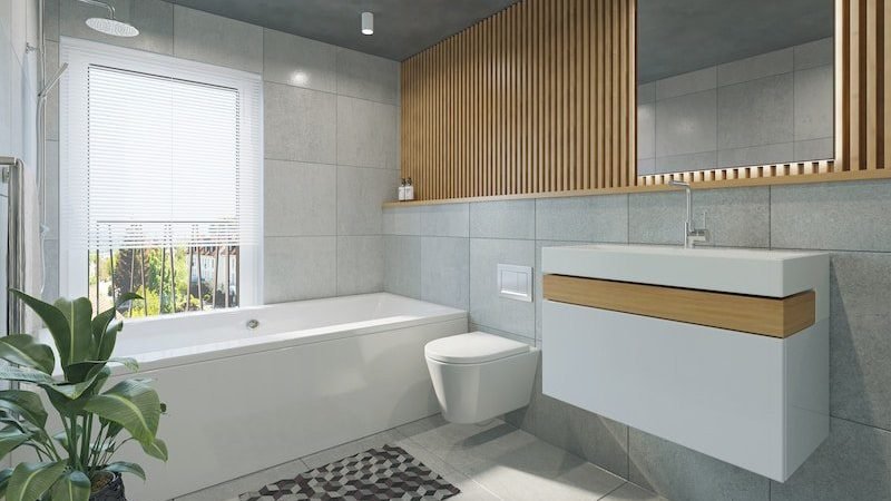 What home improvement brings the most value when it comes time to sell? 3 a bathroom with a toilet, sink, and bathtub